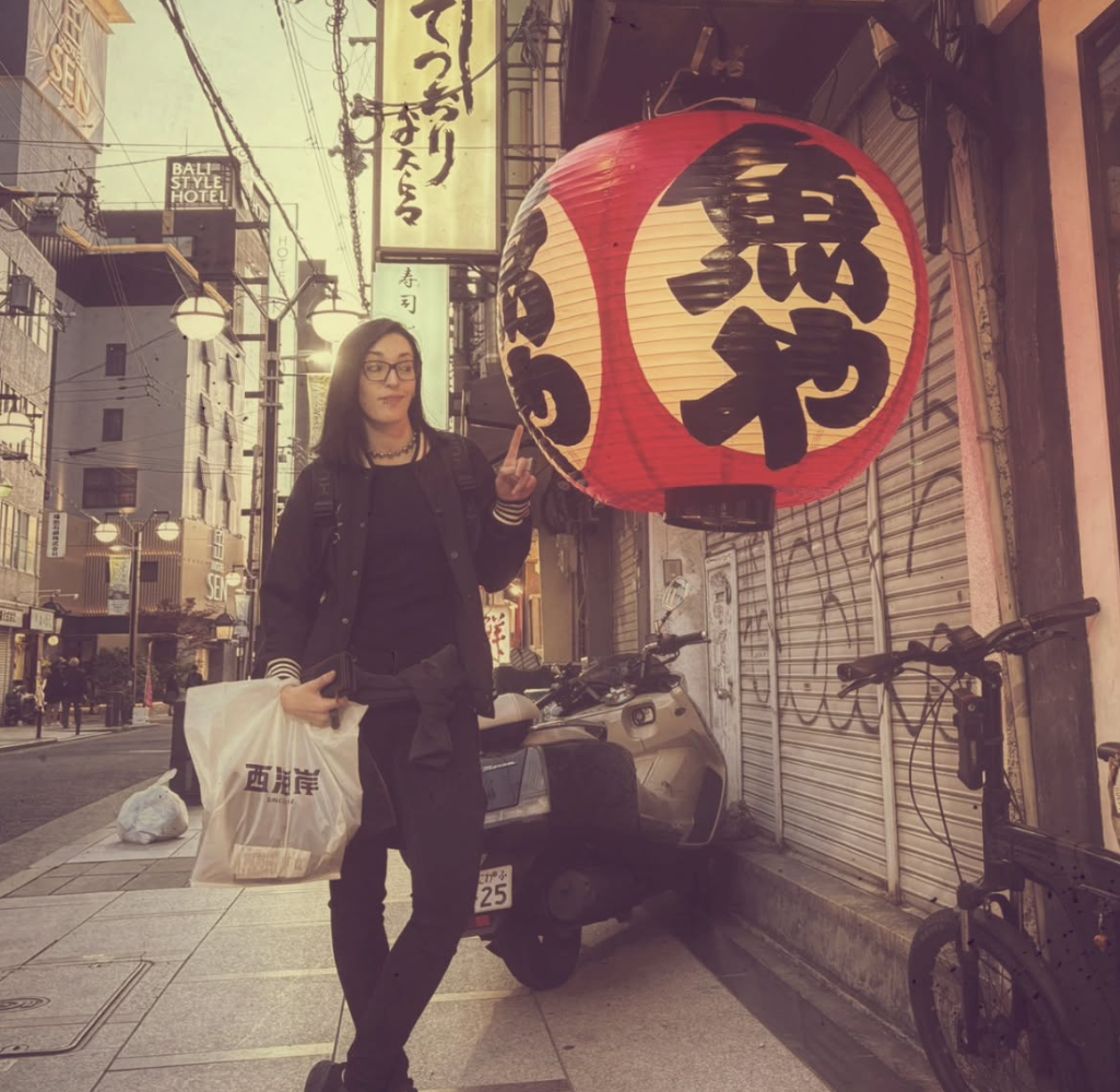 Diana Cubrilo standing on a street in Osaka, Japan